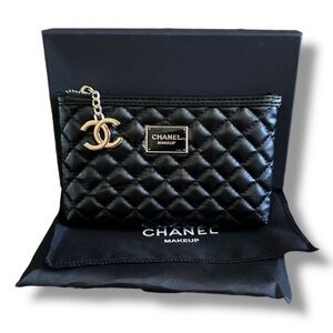 CHANEL Quilted Black Cosmetic Pouch with Gold Accent